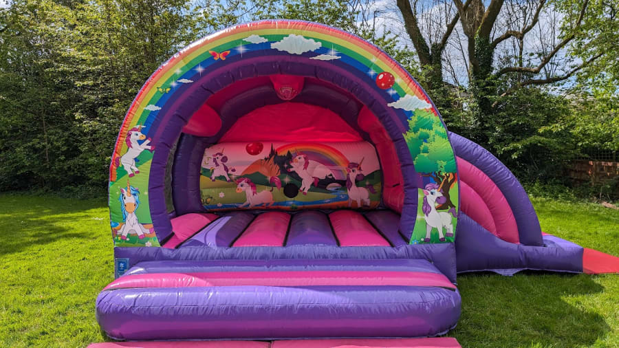 Professional unicorn bouncy castle hire in Stockport.